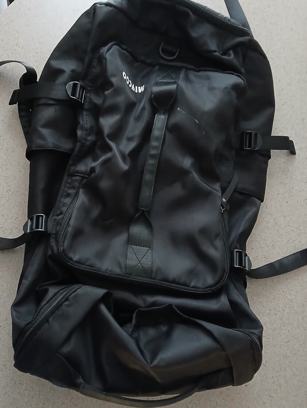 MIYCOO Black Men’s Convertible Travel Backpack Duffel Bag with Shoulder Strap.
